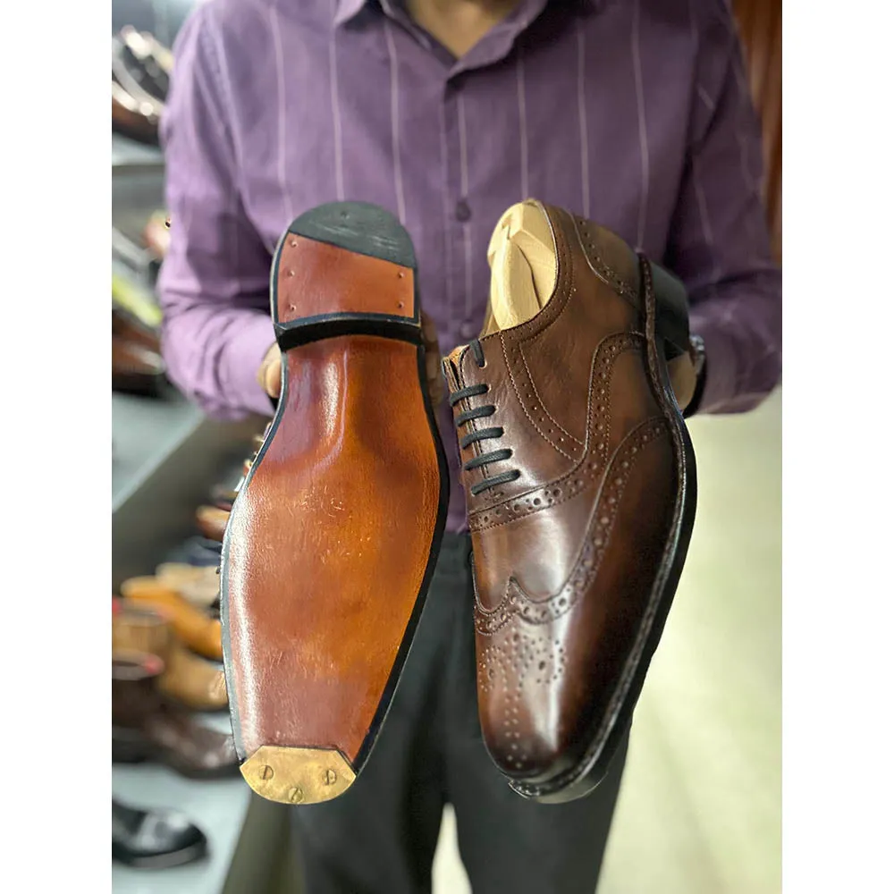 Tan Patina Goodyear Welted Mirror Glossed Wingtip Oxfords With Fiddle Back Sole & Metal Toe