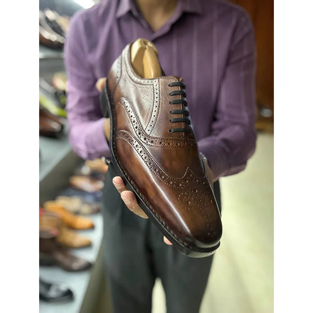 Tan Patina Goodyear Welted Mirror Glossed Wingtip Oxfords With Fiddle Back Sole & Metal Toe