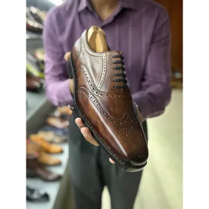 Tan Patina Goodyear Welted Mirror Glossed Wingtip Oxfords With Fiddle Back Sole & Metal Toe